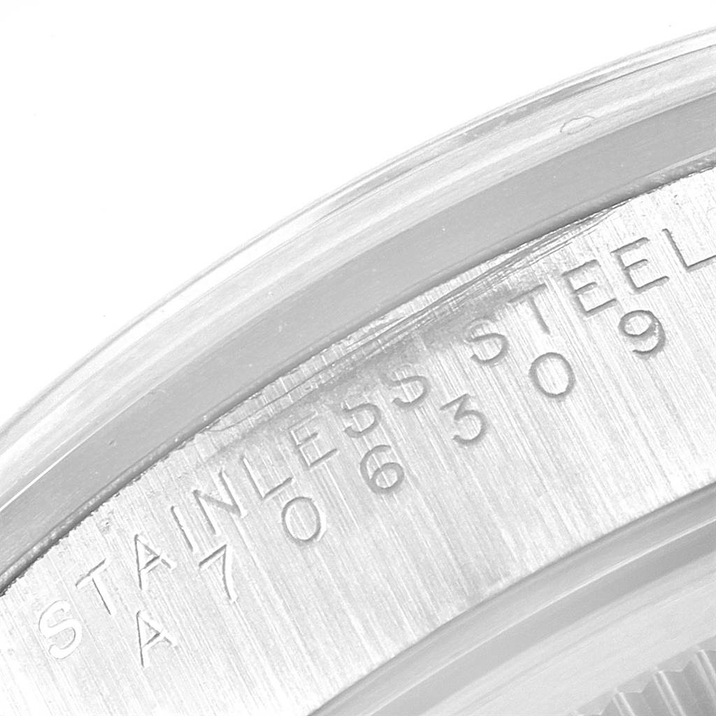 This close-up image shows the engraved stainless steel case back of a Rolex Air-King 14000 Men's Stainless Steel Silver Dial 14000 Men's Stainless Steel Silver Dial watch.