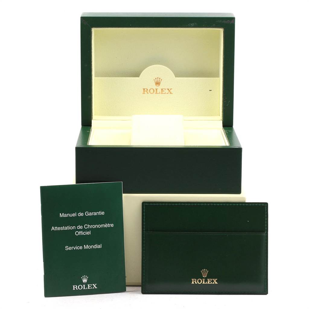 The image shows the packaging and accessories for a Rolex Air-King 114200 Men's Stainless Steel Silver Dial 114200 Men's Stainless Steel Silver Dial, including the green box, cardholder, and booklet.