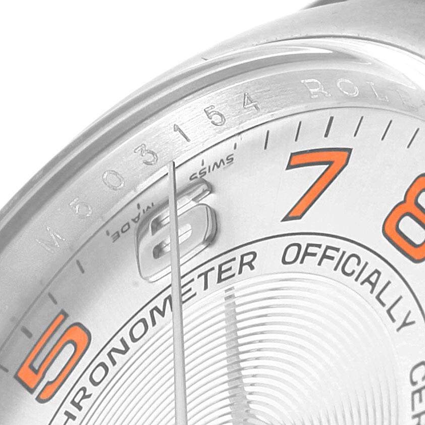 The image shows a close-up of the watch face of a Rolex Air-King 114200 Men's Stainless Steel Silver Dial 114200 Men's Stainless Steel Silver Dial, focusing on the numbers 5, 6, and 7 along with part of the bezel.