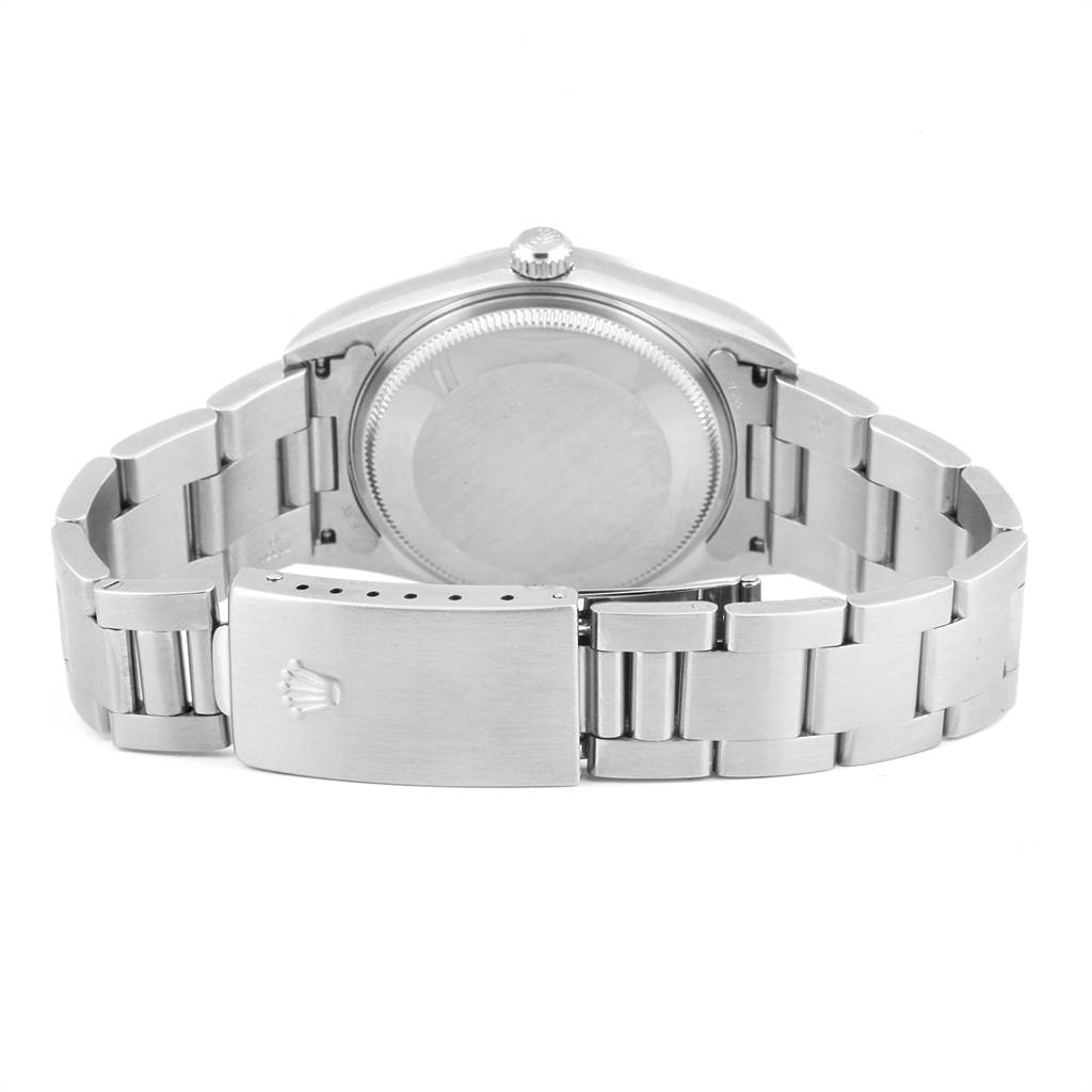 The image shows the back view of a Rolex Air-King 14000 Men's Stainless Steel White Dial 14000 Men's Stainless Steel White Dial watch, highlighting its case back, crown, and bracelet with clasp.