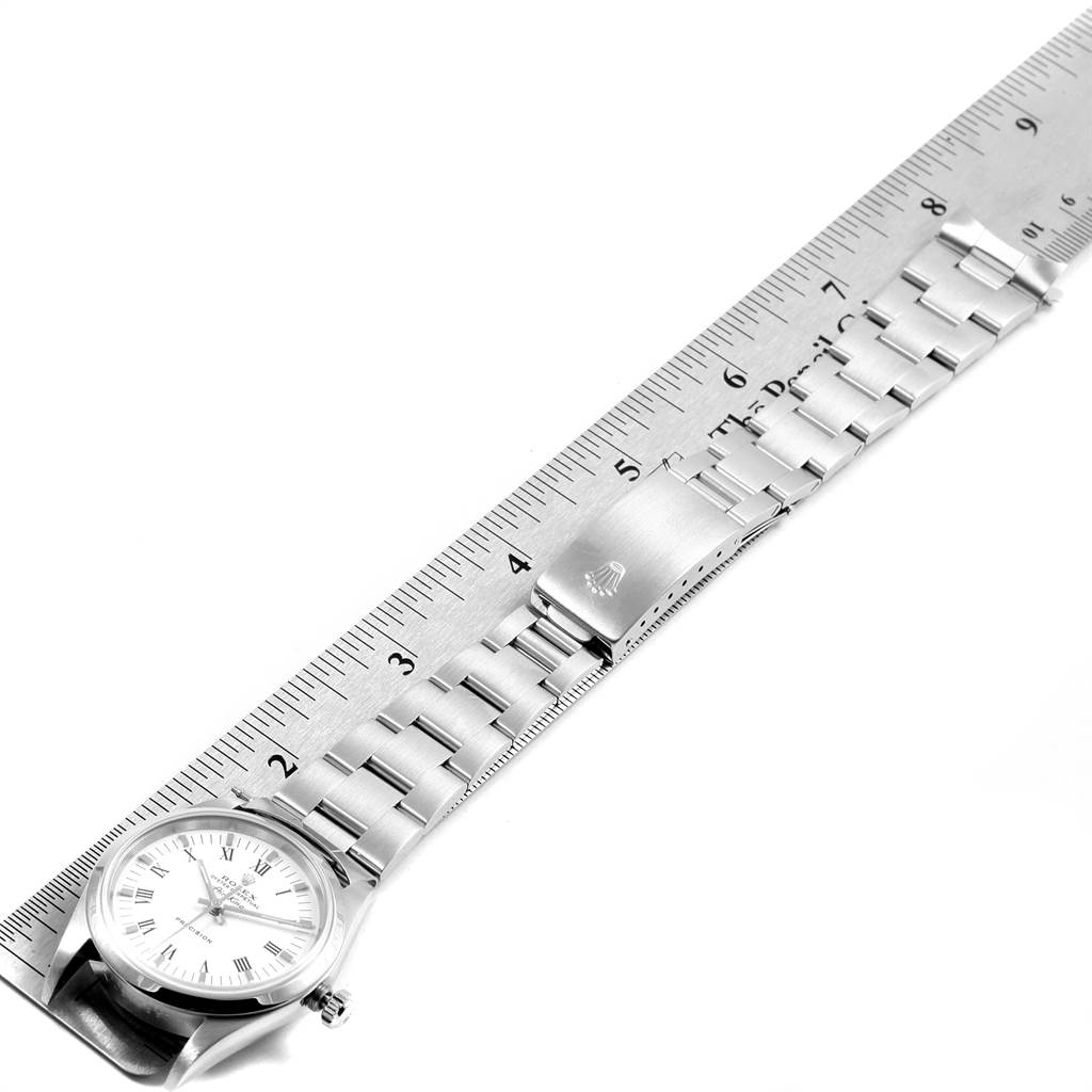 The image shows a Rolex Air-King 14000 Men's Stainless Steel White Dial 14000 Men's Stainless Steel White Dial watch laid flat next to a ruler, focusing on the watch face, bracelet, and clasp.