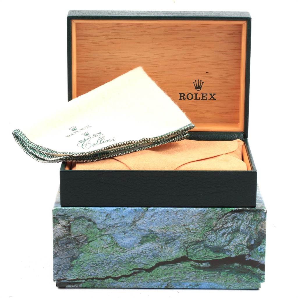This image shows the open box and packaging accessories of a Rolex Air-King 14000 Men's Stainless Steel White Dial 14000 Men's Stainless Steel White Dial watch, including a branded cleaning cloth.