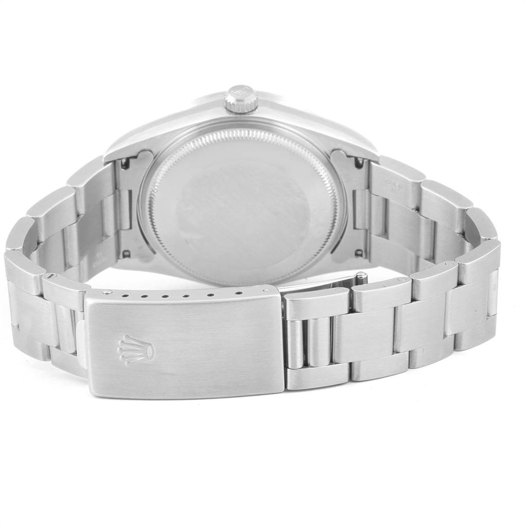 The image shows the back case and metal bracelet of a Rolex Air-King 14010 Men's Stainless Steel Silver Dial 14010 Men's Stainless Steel Silver Dial watch, focusing on the clasp and closed back case.