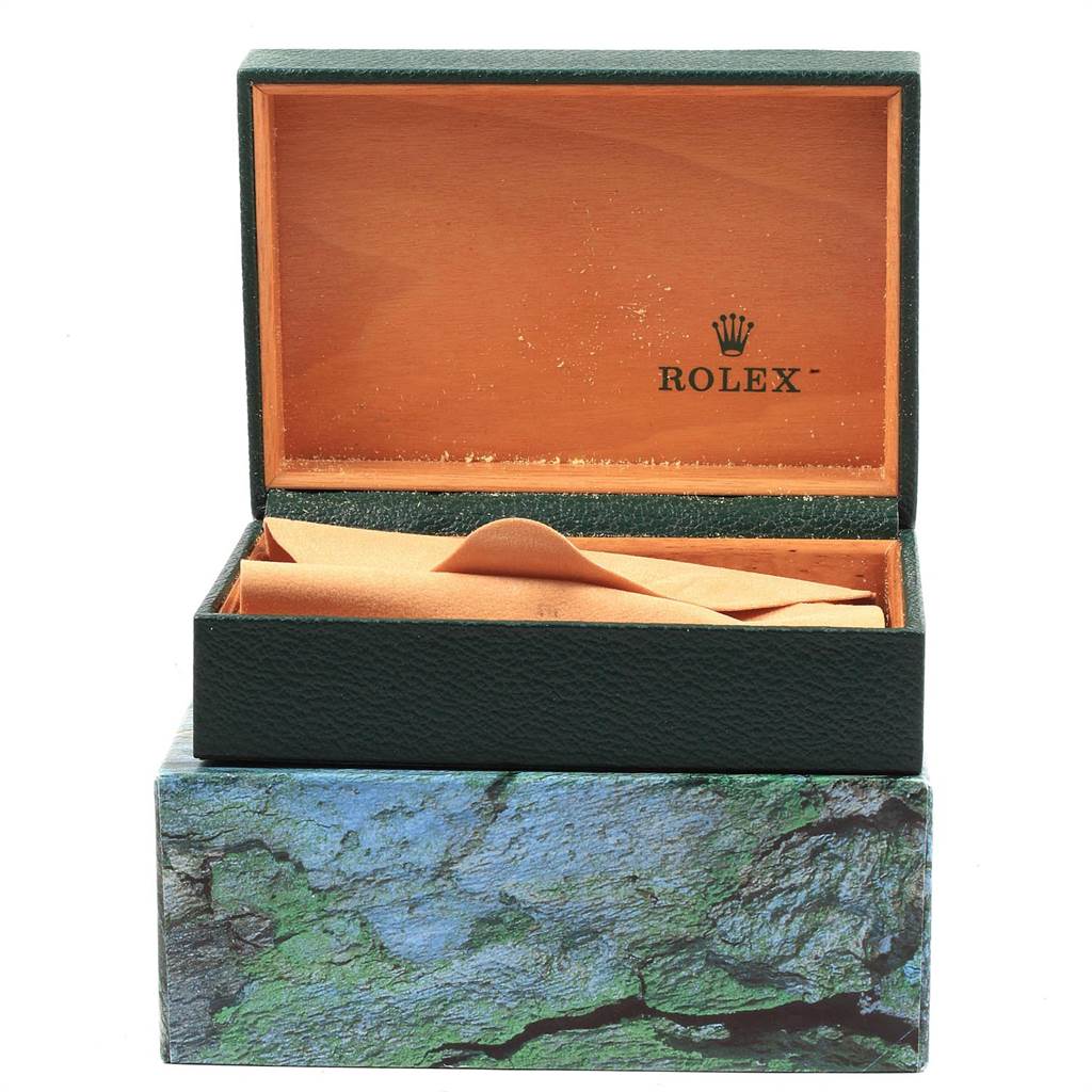 The image shows an open Rolex Air-King 14000 Men's Stainless Steel Black Dial 14000 Men's Stainless Steel Black Dial watch box, revealing the interior with a tan cloth.