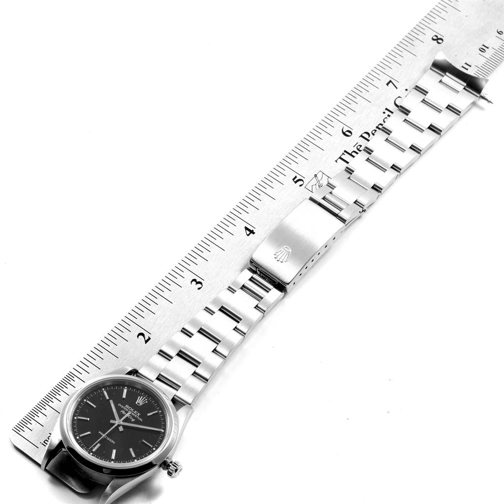 The image shows a Rolex Air-King 14000 Men's Stainless Steel Black Dial 14000 Men's Stainless Steel Black Dial watch laid flat, highlighting its stainless steel bracelet, clasp, and black dial, measured against a ruler.