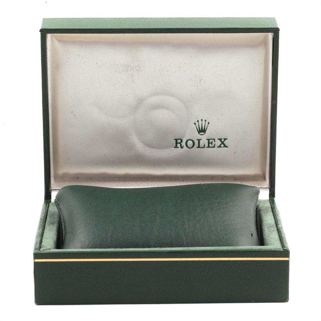 The image shows an open green box for the Rolex Air-King 14000 Men's Stainless Steel Black Dial 14000 Men's Stainless Steel Black Dial watch, displaying the interior cushion and logo.