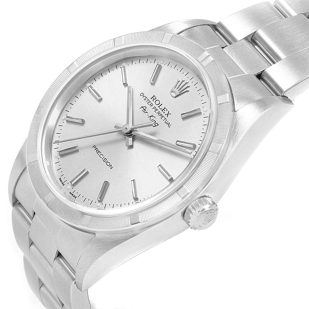 The image shows a close-up angle of the Rolex Air-King 14010 Men's Stainless Steel Silver Dial 14010 Men's Stainless Steel Silver Dial watch highlighting the face, bezel, crown, and part of the bracelet.