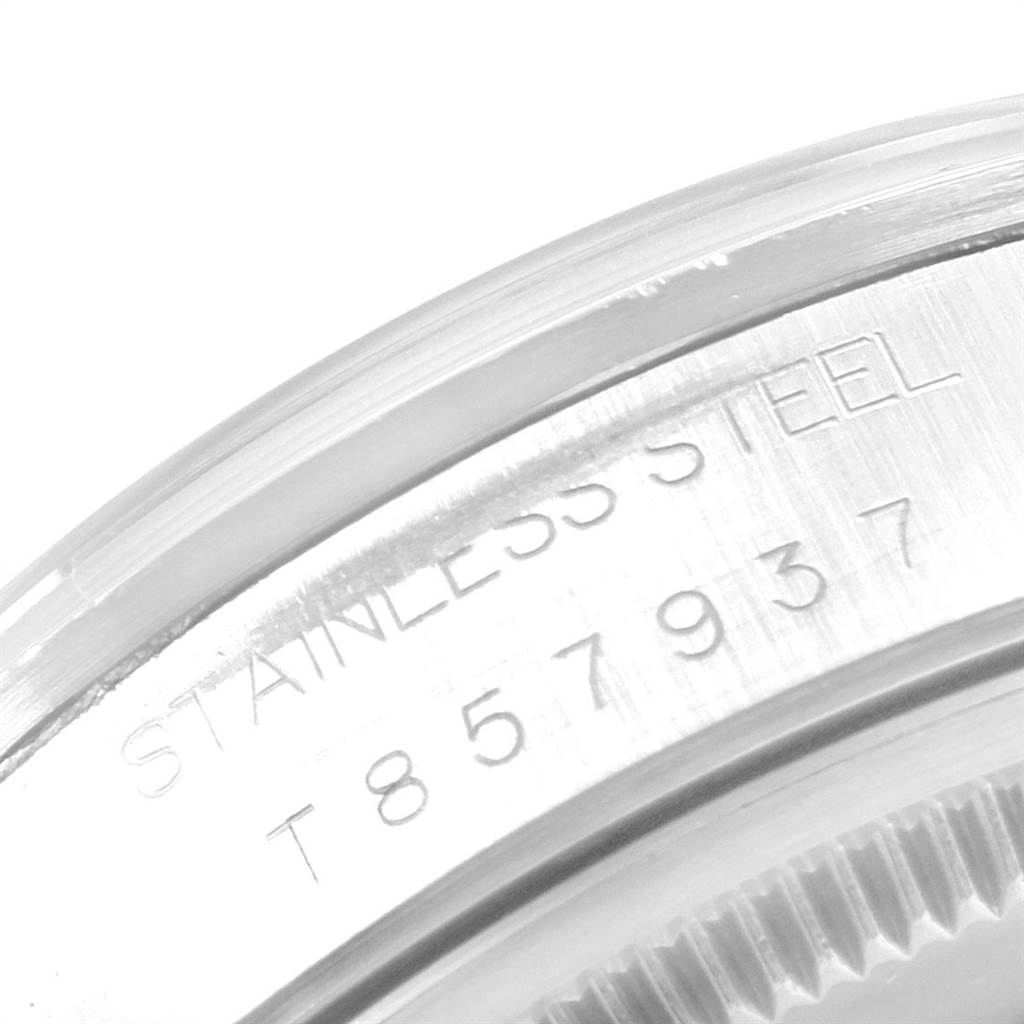 The image shows a close-up angle of the serial number and "STAINLESS STEEL" engraving on the case back rim of a Rolex Air-King 14000 Men's Stainless Steel Black Dial 14000 Men's Stainless Steel Black Dial watch.