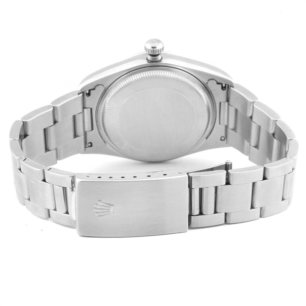The image shows the back view of a Rolex Air-King 14000 Men's Stainless Steel Silver Dial 14000 Men's Stainless Steel Silver Dial watch, highlighting the case back, crown, and metallic bracelet with clasp.
