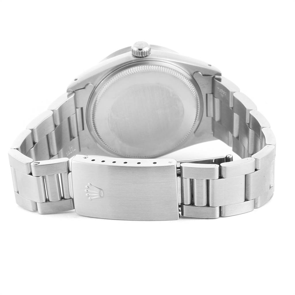 The image shows the back of the Rolex Air-King 14010 Men's Stainless Steel Blue Dial 14010 Men's Stainless Steel Blue Dial watch, highlighting its case back and oyster bracelet with the clasp open.