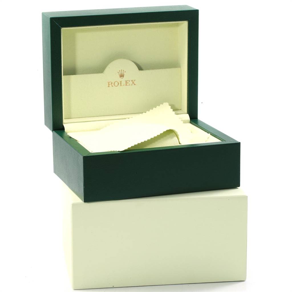 The image shows the open box of a Rolex Air-King 114234 Men's Stainless Steel White Dial 114234 Men's Stainless Steel White Dial watch, highlighting its interior along with a cleaning cloth.