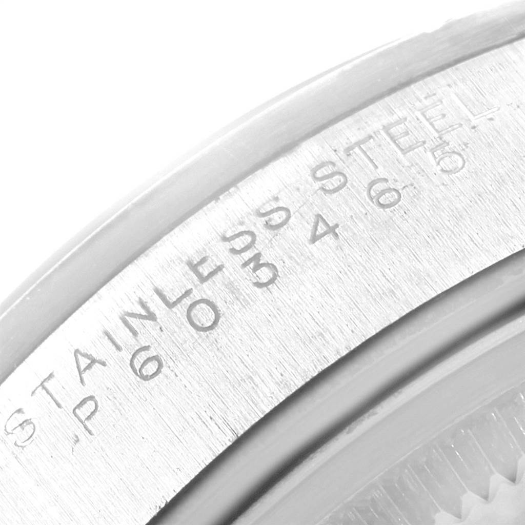 This image shows a close-up of the case back engraving of a Rolex Air-King 14000 Men's Stainless Steel Black Dial 14000 Men's Stainless Steel Black Dial watch, highlighting the "STAINLESS STEEL" text.
