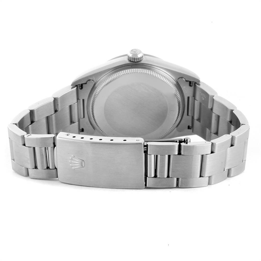 This image shows the rear view of a Rolex Air-King 14000 Men's Stainless Steel Blue Dial 14000 Men's Stainless Steel Blue Dial watch, focusing on the case back and bracelet clasp.