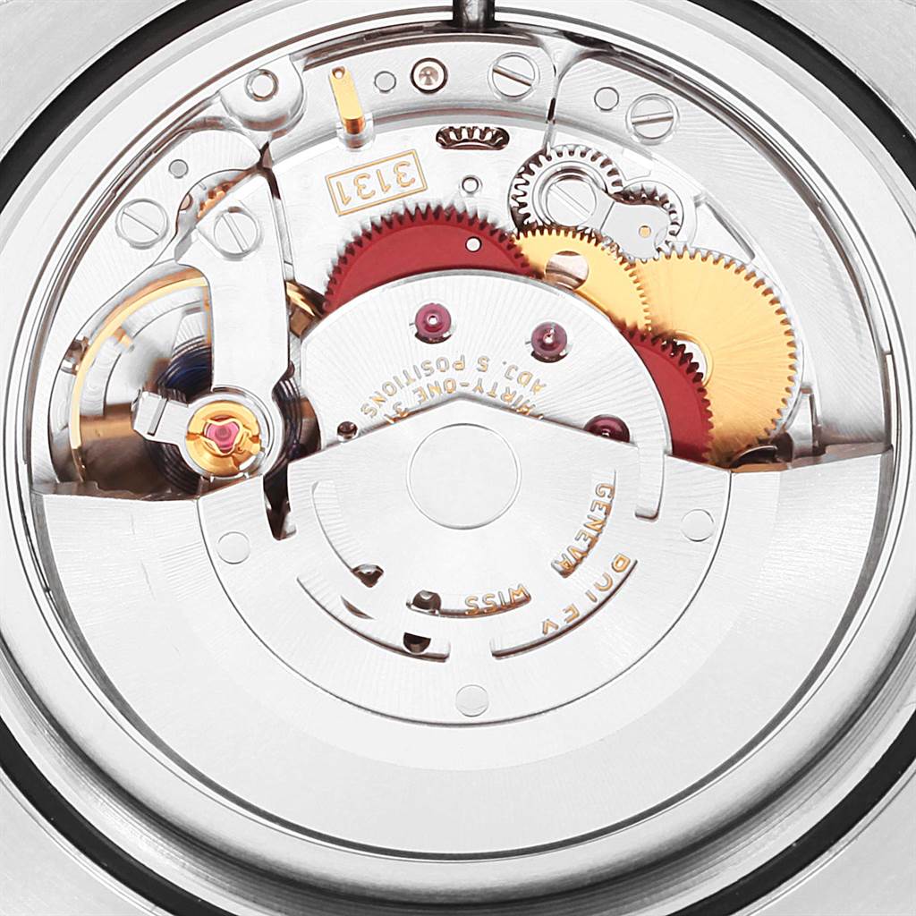 This image shows the internal mechanism of a Rolex Air-King 116900 Men's Stainless Steel Black Dial 116900 Men's Stainless Steel Black Dial watch, highlighting gears and components at a close-up angle.