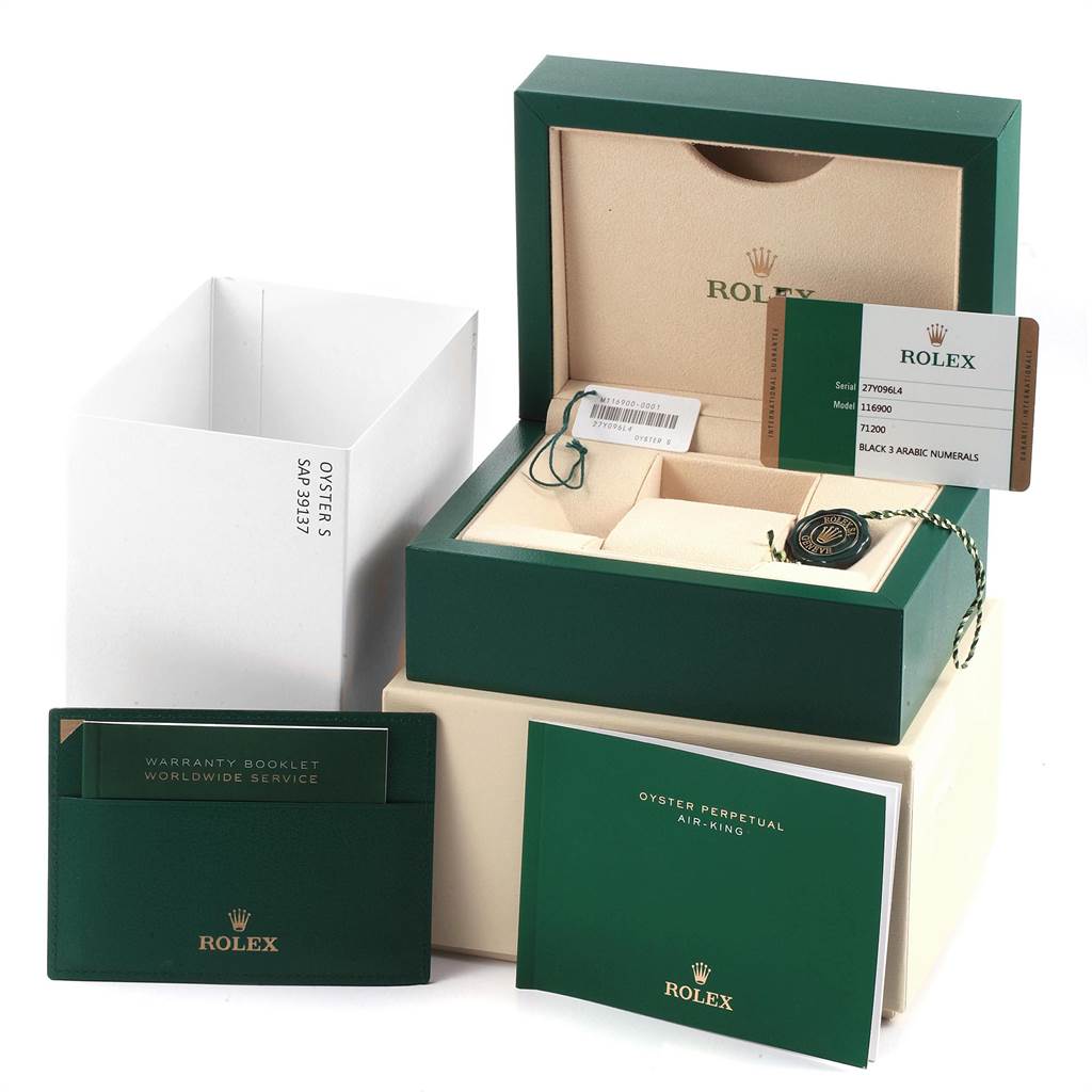 This image shows the packaging and accessories of a Rolex Air-King 116900 Men's Stainless Steel Black Dial 116900 Men's Stainless Steel Black Dial watch, including the box, warranty booklet, and manuals.