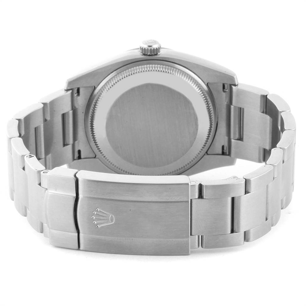 The image shows the back view of a Rolex Air-King 114210 Men's Stainless Steel Blue Dial 114210 Men's Stainless Steel Blue Dial watch, highlighting its clasp, bracelet, and case back.