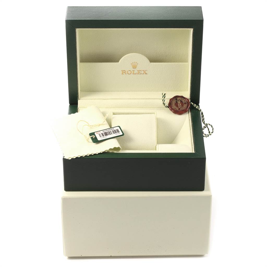 The image shows an open box with branding for Rolex Air-King 114210 Men's Stainless Steel Blue Dial 114210 Men's Stainless Steel Blue Dial, containing a tag, cleaning cloth, and seal.
