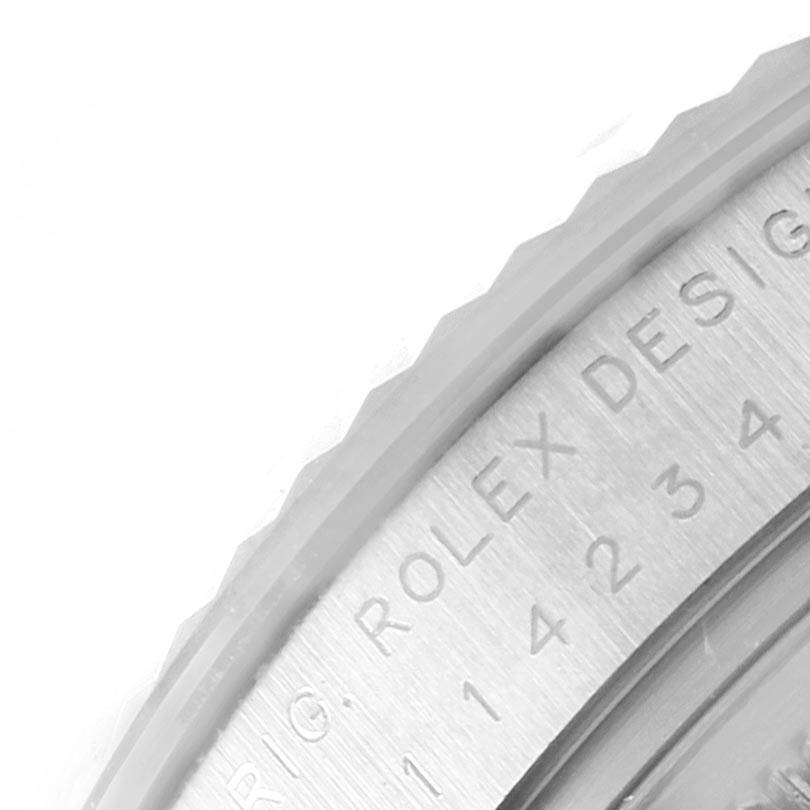 This image shows a close-up view of the side engraving on the bezel of a Rolex Air-King 114234 Men's Stainless Steel White Dial 114234 Men's Stainless Steel White Dial watch.