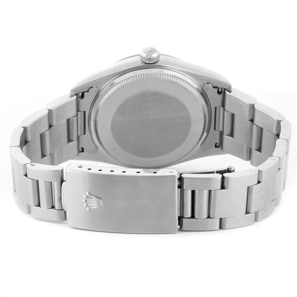 This image shows the backside and bracelet of the Rolex Air-King 14000 Men's Stainless Steel Pink Dial 14000 Men's Stainless Steel Pink Dial watch, highlighting the clasp and case back.