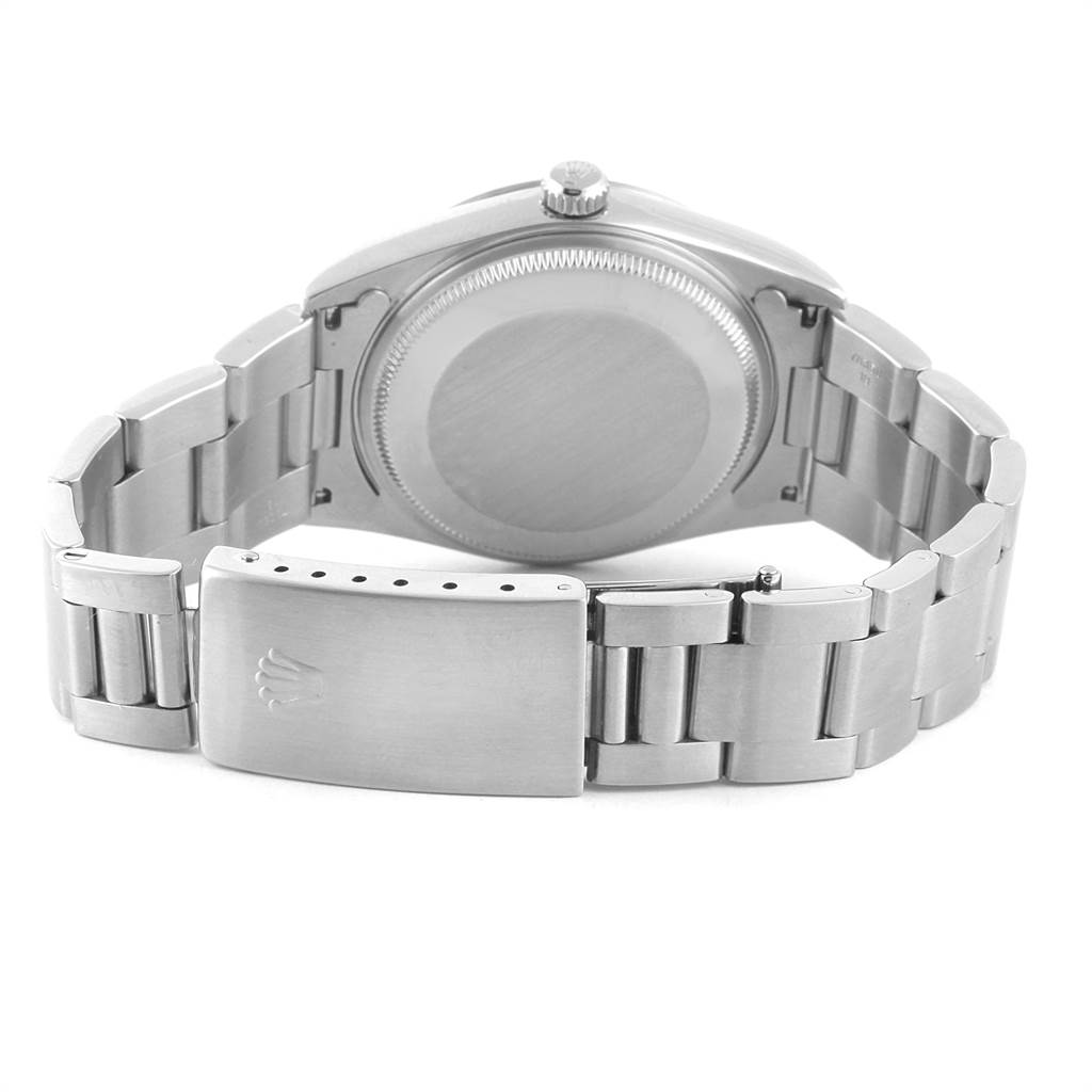 The image shows the back view of a Rolex Air-King 14000 Men's Stainless Steel Blue Dial 14000 Men's Stainless Steel Blue Dial watch, focusing on its case back and metal bracelet with a clasp.