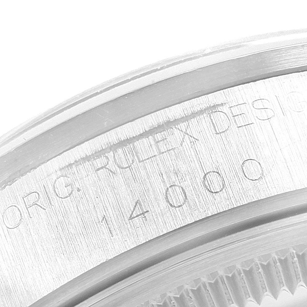 This image shows a close-up angle of the engraved case back of a Rolex Air-King 14000 Men's Stainless Steel Blue Dial 14000 Men's Stainless Steel Blue Dial model.