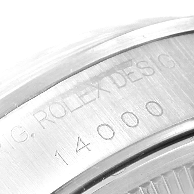 This image shows a close-up of the case back and engraved serial number on the Rolex Air-King 14000 Men's Stainless Steel Blue Dial 14000 Men's Stainless Steel Blue Dial model watch.