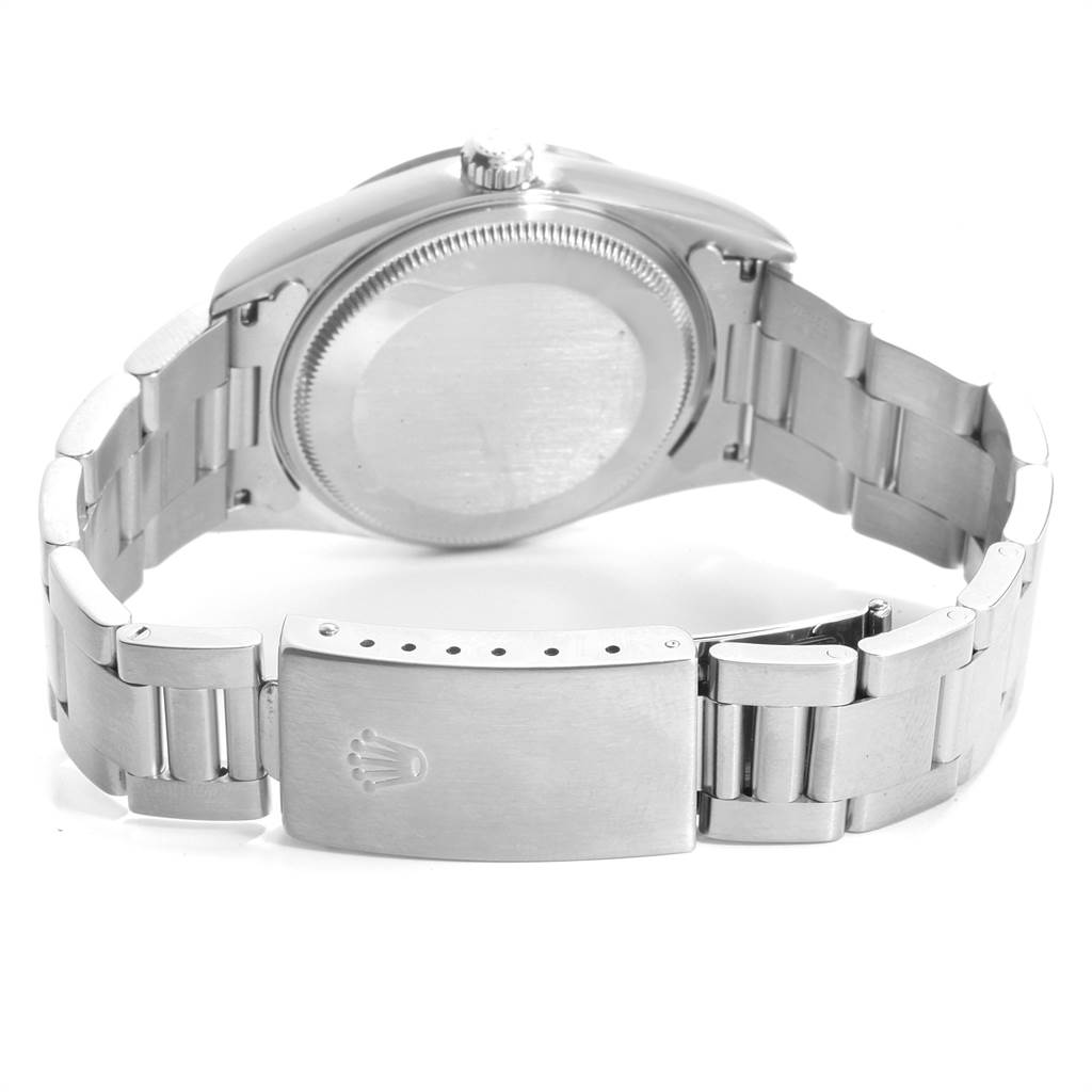 This image shows the backside and clasp of a Rolex Air-King 14000 Men's Stainless Steel Blue Dial 14000 Men's Stainless Steel Blue Dial watch from an oblique angle.