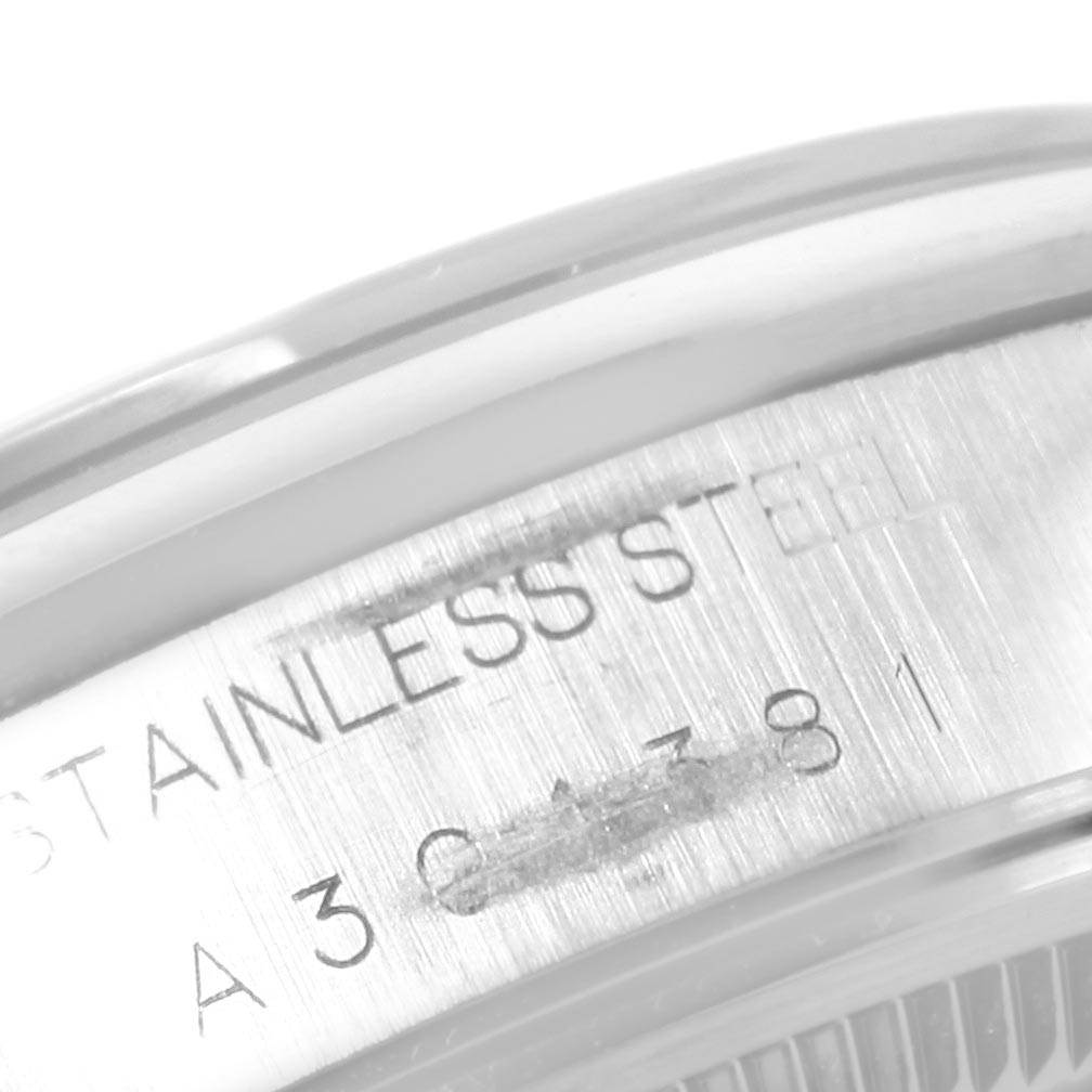 The image shows a close-up of the engraved stainless steel caseback of a Rolex Air-King 14000 Men's Stainless Steel Blue Dial 14000 Men's Stainless Steel Blue Dial watch.