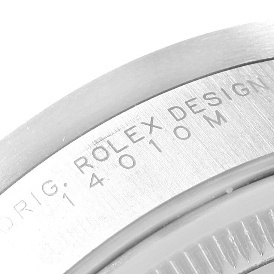 This image shows a close-up of the engraved text and partial bezel of the Rolex Air-King 14010 Men's Stainless Steel Silver Dial 14010 Men's Stainless Steel Silver Dial watch.