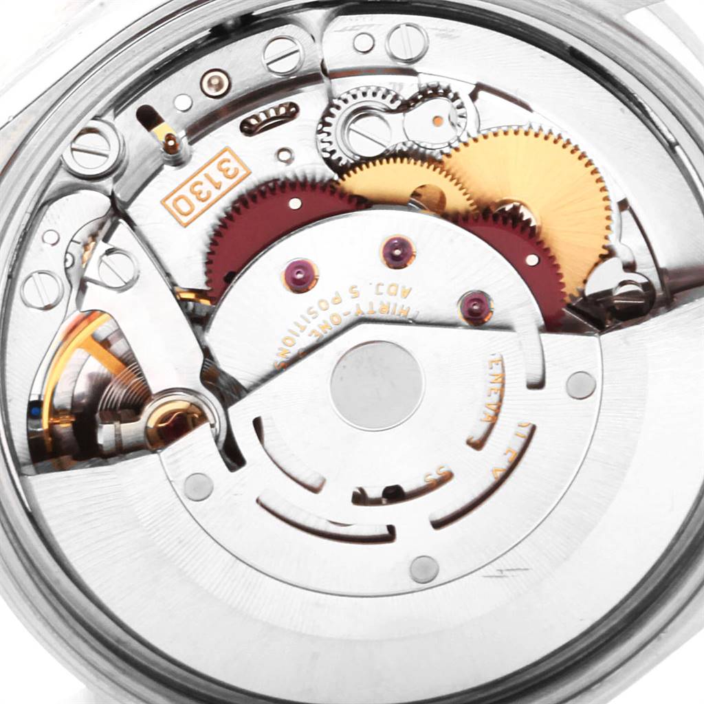This is a close-up view of the movement mechanism of a Rolex Air-King 14010 Men's Stainless Steel Silver Dial 14010 Men's Stainless Steel Silver Dial watch, showcasing its gears and components.