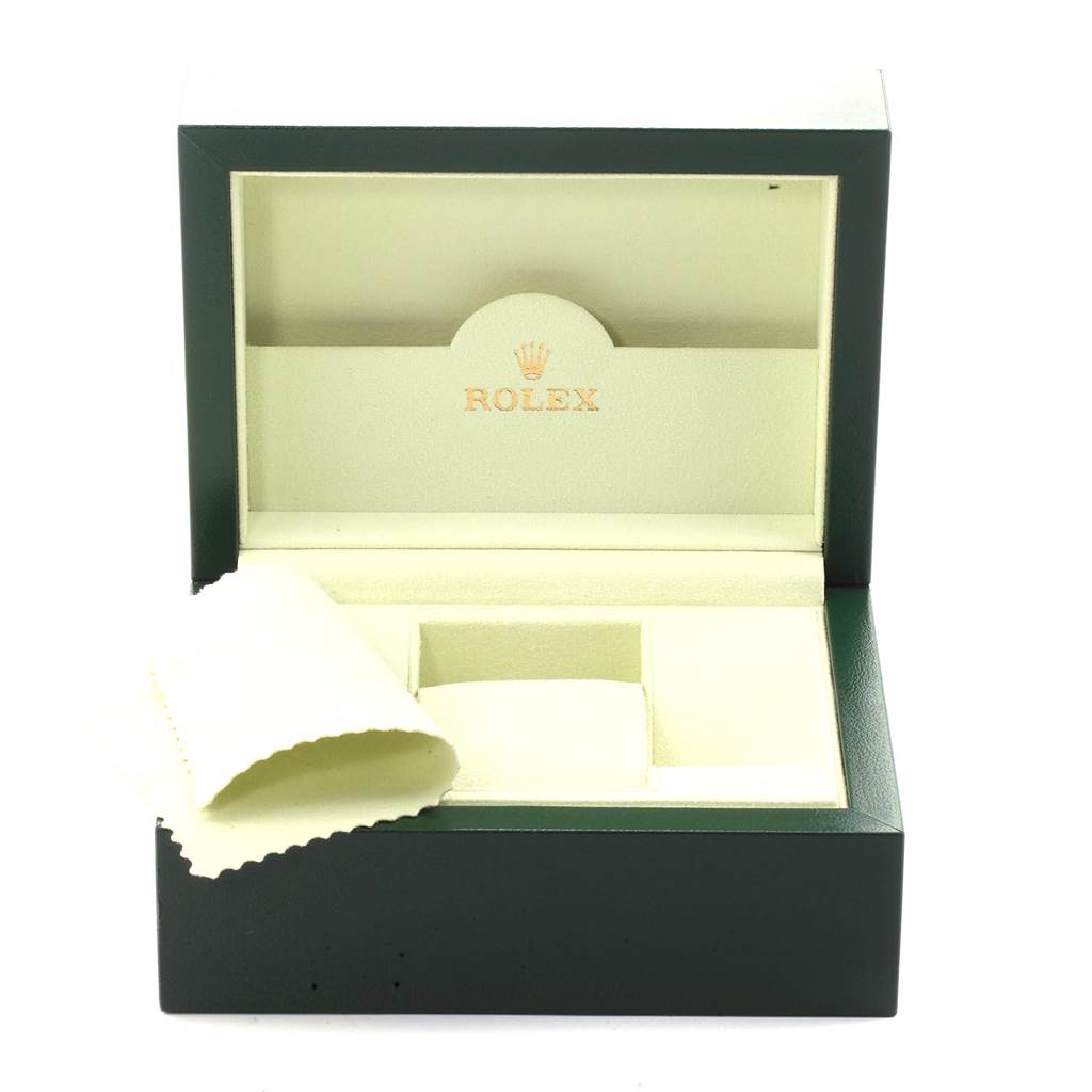 This image shows an open Rolex watch box for the Air-King model, displaying its interior compartments and a cleaning cloth.