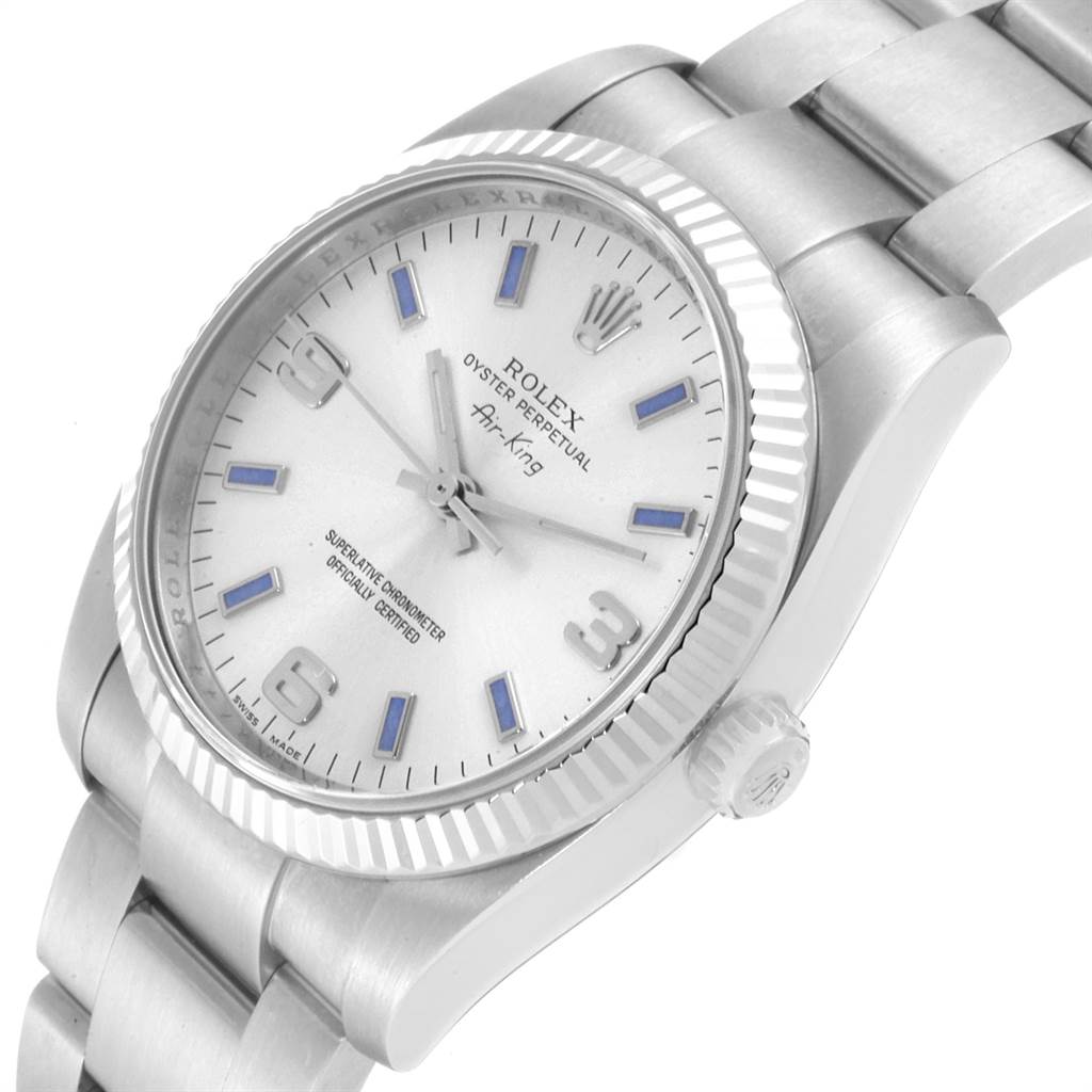 The Rolex Air-King 114234 Men's Stainless Steel Silver Dial 114234 Men's Stainless Steel Silver Dial watch is shown at an angle highlighting the face, bezel, crown, and part of the bracelet.
