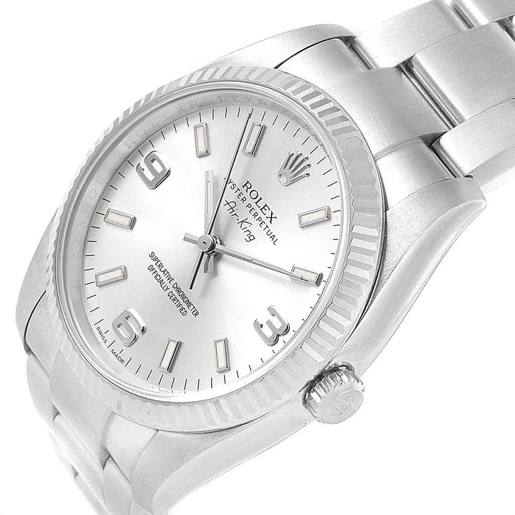 The image shows a front angle of a Rolex Air-King 114234 Men's Stainless Steel Silver Dial 114234 Men's Stainless Steel Silver Dial watch highlighting its face, bezel, crown, and stainless steel bracelet.