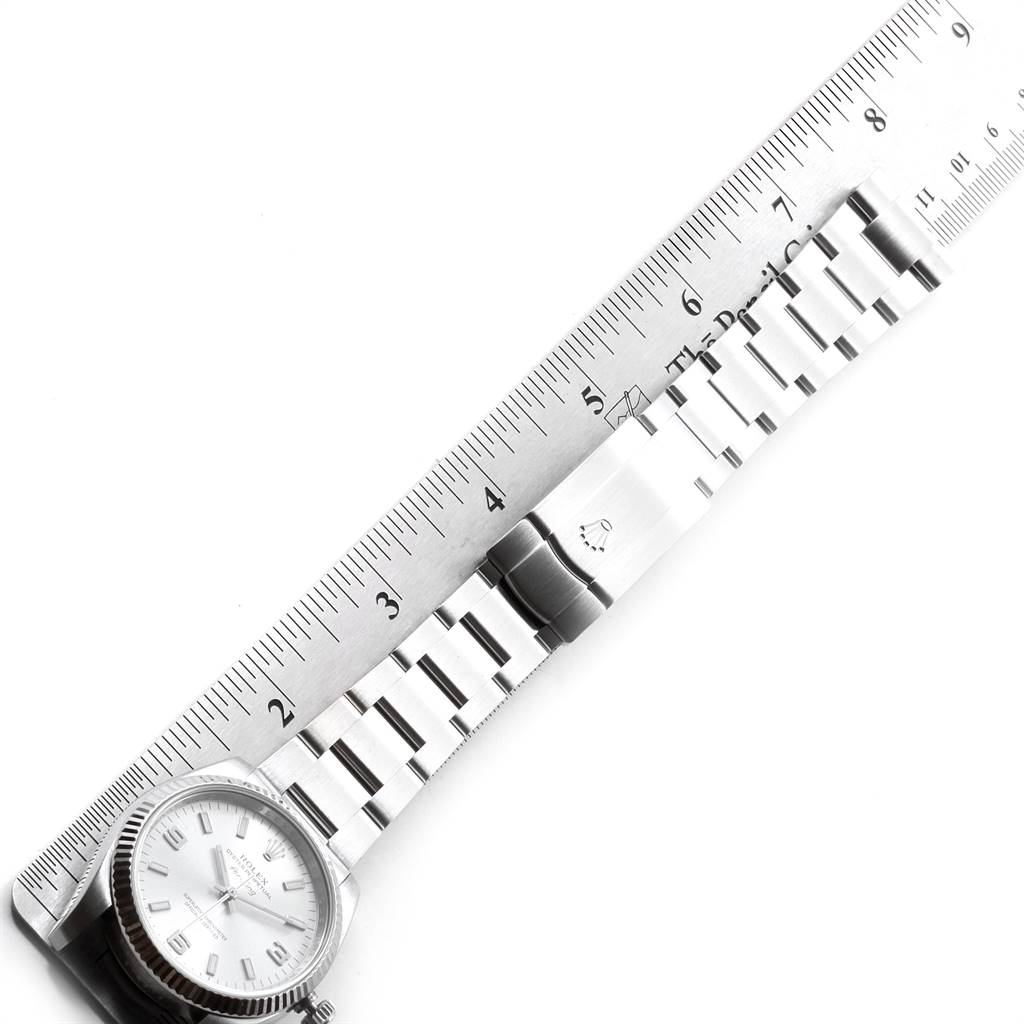 The image shows a Rolex Air-King 114234 Men's Stainless Steel Silver Dial 114234 Men's Stainless Steel Silver Dial watch with its bracelet and clasp, aligned next to a ruler for measurement.