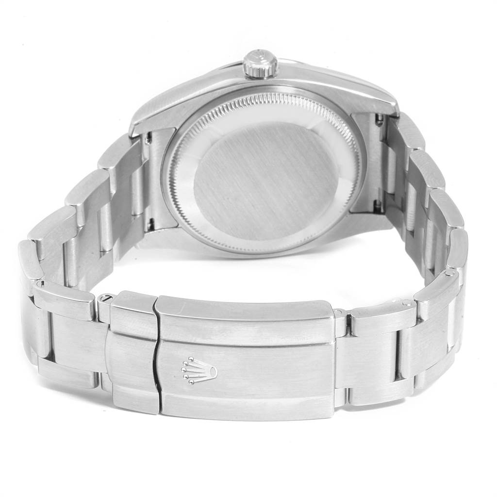 The image shows the back view of a Rolex Air-King 114200 Men's Stainless Steel Silver Dial 114200 Men's Stainless Steel Silver Dial watch, focusing on the case back and bracelet clasp.