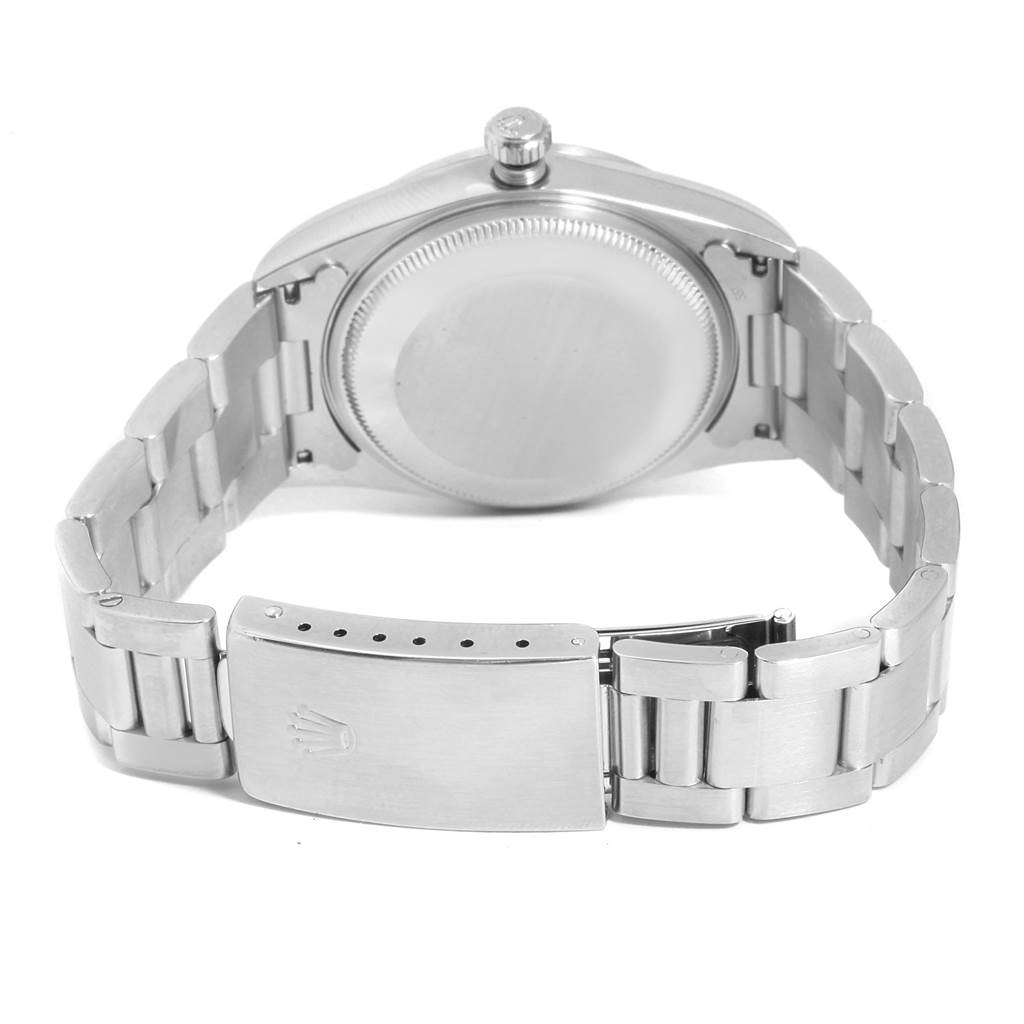 The image shows the rear view of a Rolex Air-King 14000 Men's Stainless Steel Blue Dial 14000 Men's Stainless Steel Blue Dial watch, focusing on the case back, bracelet, and clasp.