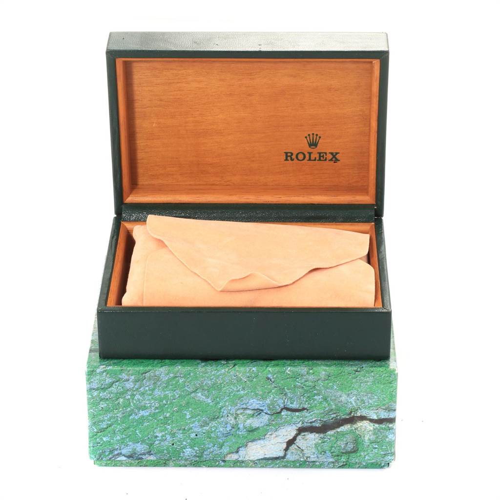 This is the box for a Rolex Air-King 14010 Men's Stainless Steel Blue Dial 14010 Men's Stainless Steel Blue Dial watch, shown open with a cloth inside and the Rolex logo visible on the lid.