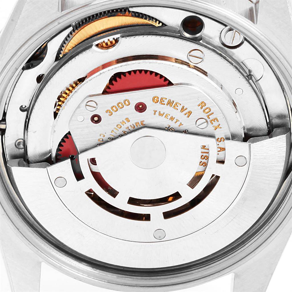 This image shows the movement mechanism inside the Rolex Air-King 14010 Men's Stainless Steel Blue Dial 14010 Men's Stainless Steel Blue Dial watch, with intricate gears and components visible.