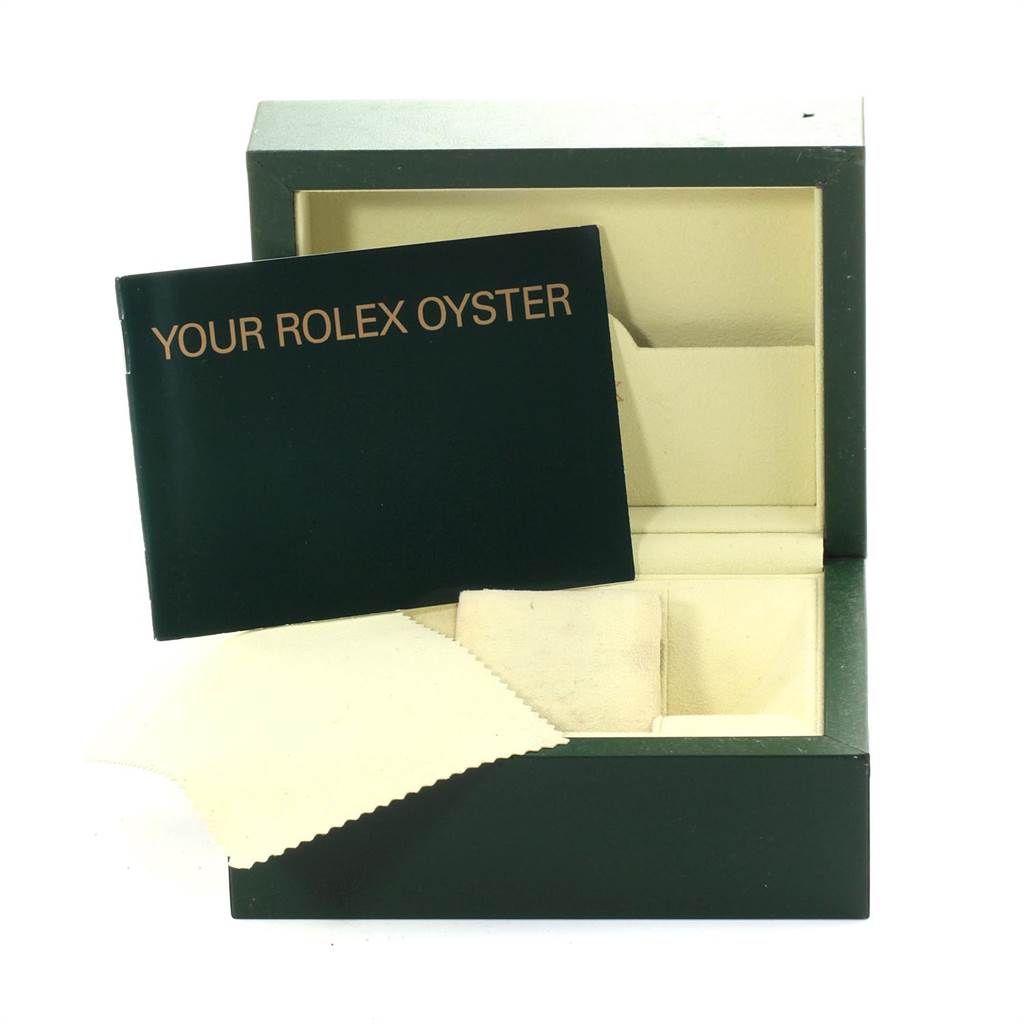 The image shows an open box for a Rolex Air-King 114200 Men's Stainless Steel Blue Dial 114200 Men's Stainless Steel Blue Dial with a booklet titled "Your Rolex Oyster" and a cleaning cloth.