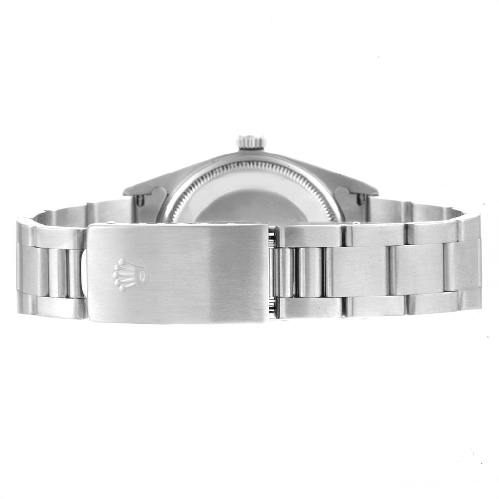 The image shows the back view of a Rolex Air-King 14010 Men's Stainless Steel White Dial 14010 Men's Stainless Steel White Dial watch, focusing on the clasp and bracelet.