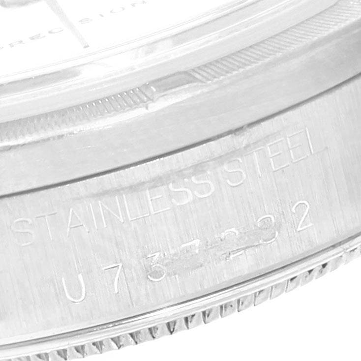 This is a close-up image of the side view of the stainless steel case of the Rolex Air-King 14010 Men's Stainless Steel White Dial 14010 Men's Stainless Steel White Dial watch, showing the model number and material.