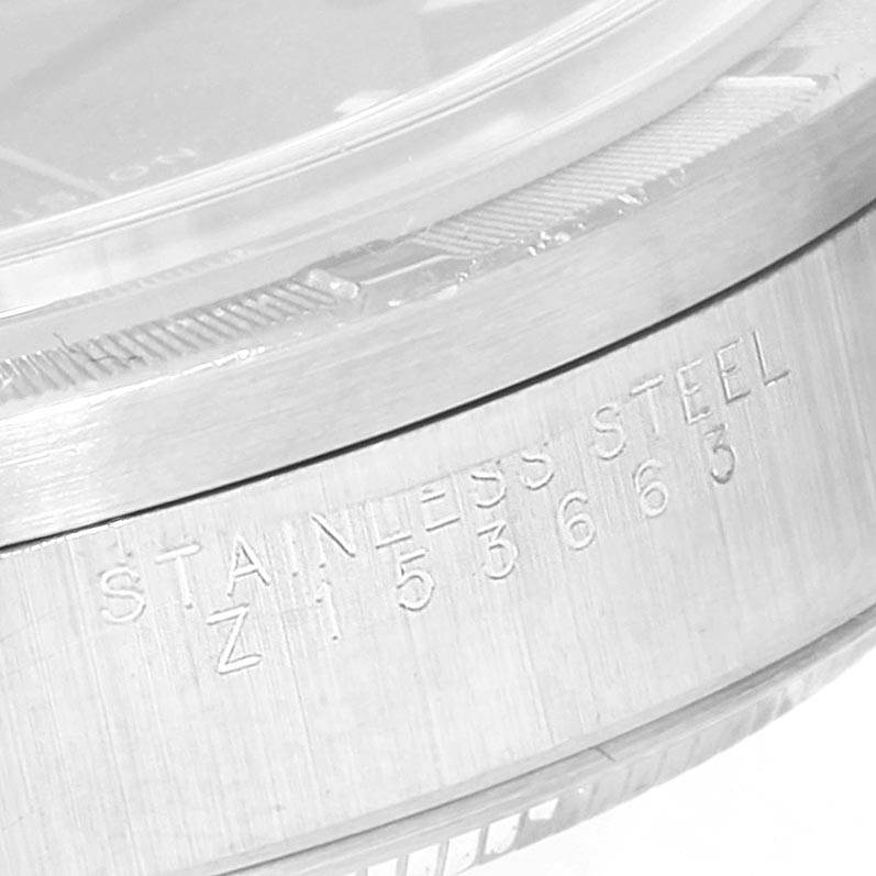 The image shows a close-up angle of the side case of a Rolex Air-King 14010 Men's Stainless Steel Blue Dial 14010 Men's Stainless Steel Blue Dial watch, highlighting the stainless steel engraving.