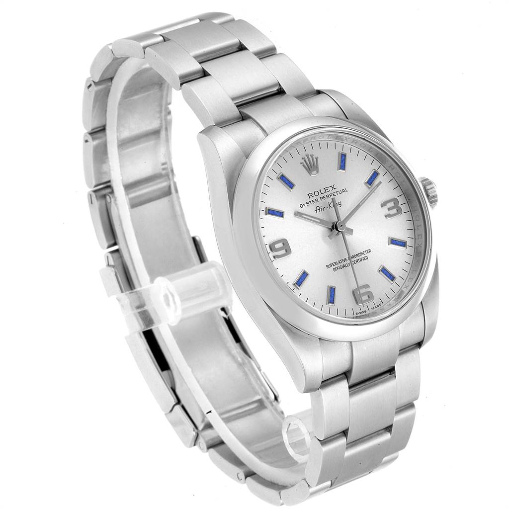 The Rolex Air-King 114200 Men's Stainless Steel Silver Dial 114200 Men's Stainless Steel Silver Dial watch is shown from an angled side view, displaying the dial, bezel, crown, and bracelet.