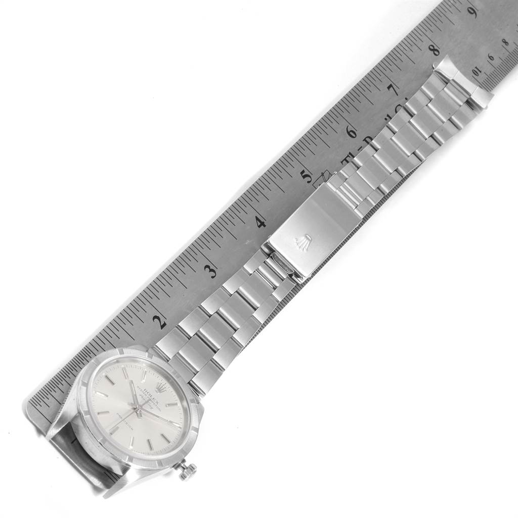 The Rolex Air-King 14010 Men's Stainless Steel Silver Dial 14010 Men's Stainless Steel Silver Dial watch is shown from above, displaying the entire length including the dial, bracelet, and clasp.