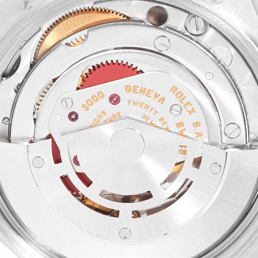 This image shows a close-up view of the intricate mechanical movement of the Rolex Air-King 14010 Men's Stainless Steel Silver Dial 14010 Men's Stainless Steel Silver Dial watch.
