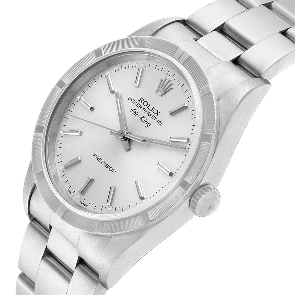 The Rolex Air-King 14010 Men's Stainless Steel Silver Dial 14010 Men's Stainless Steel Silver Dial watch is shown from a close-up, slanted angle highlighting the face, bezel, bracelet, and crown.