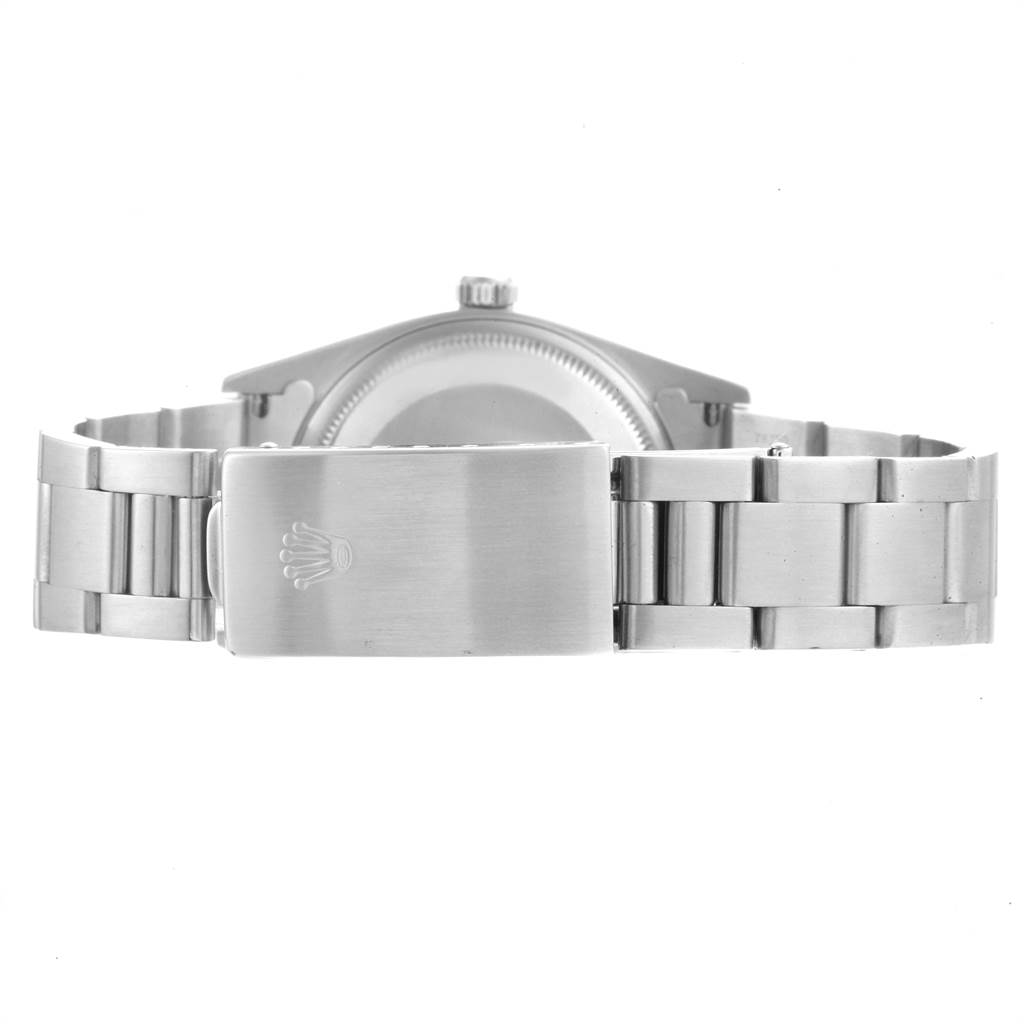 The image shows the back side of a Rolex Air-King 14010 Men's Stainless Steel Silver Dial 14010 Men's Stainless Steel Silver Dial watch, highlighting the metal bracelet and clasp.