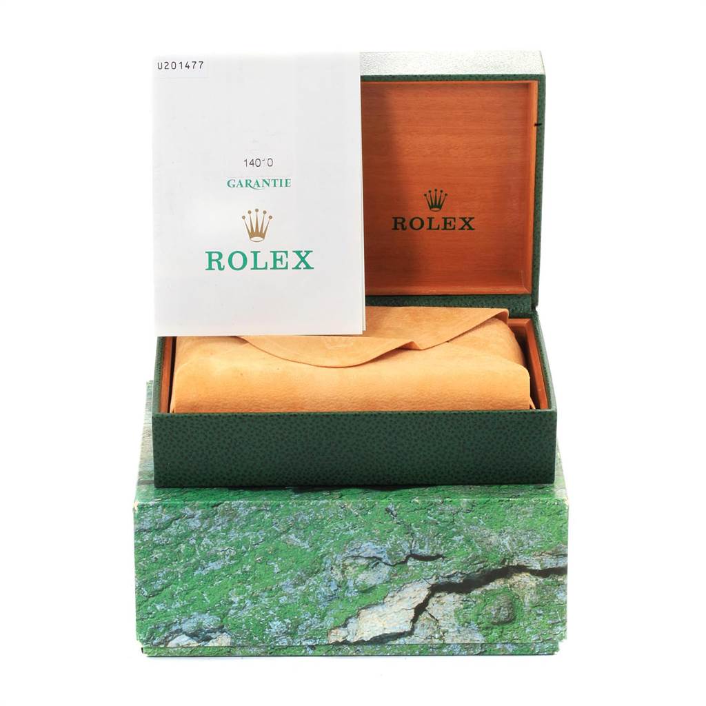 The image shows a Rolex Air-King 14010 Men's Stainless Steel Silver Dial 14010 Men's Stainless Steel Silver Dial watch in its leather pouch, placed inside its open green and wooden box with a warranty card on top.