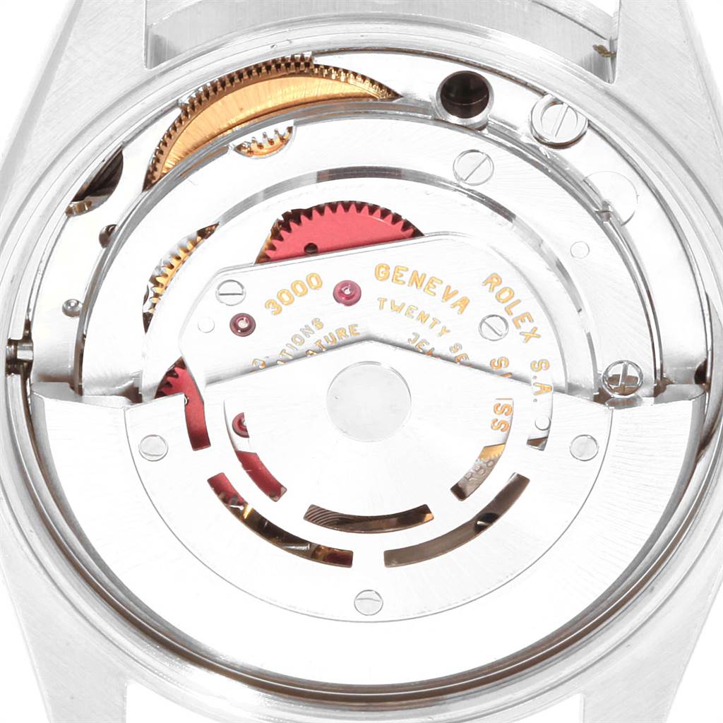 This image shows the movement and intricate internal mechanics of a Rolex Air-King 14010 Men's Stainless Steel Black Dial 14010 Men's Stainless Steel Black Dial watch from a close-up angle.