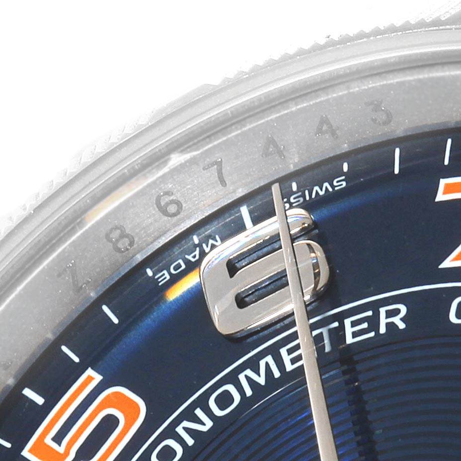 This close-up image shows the dial and bezel of a Rolex Air-King 114210 Men's Stainless Steel Blue Dial 114210 Men's Stainless Steel Blue Dial watch, highlighting the numerals and part of the second hand.
